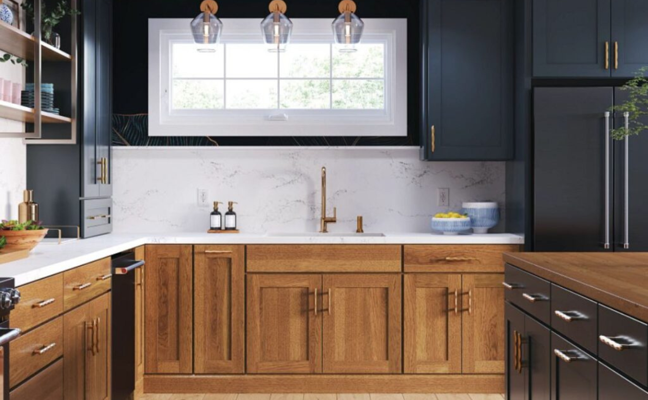 Blue and brown cabinets in a kiba kitchen display at D&M Interiors