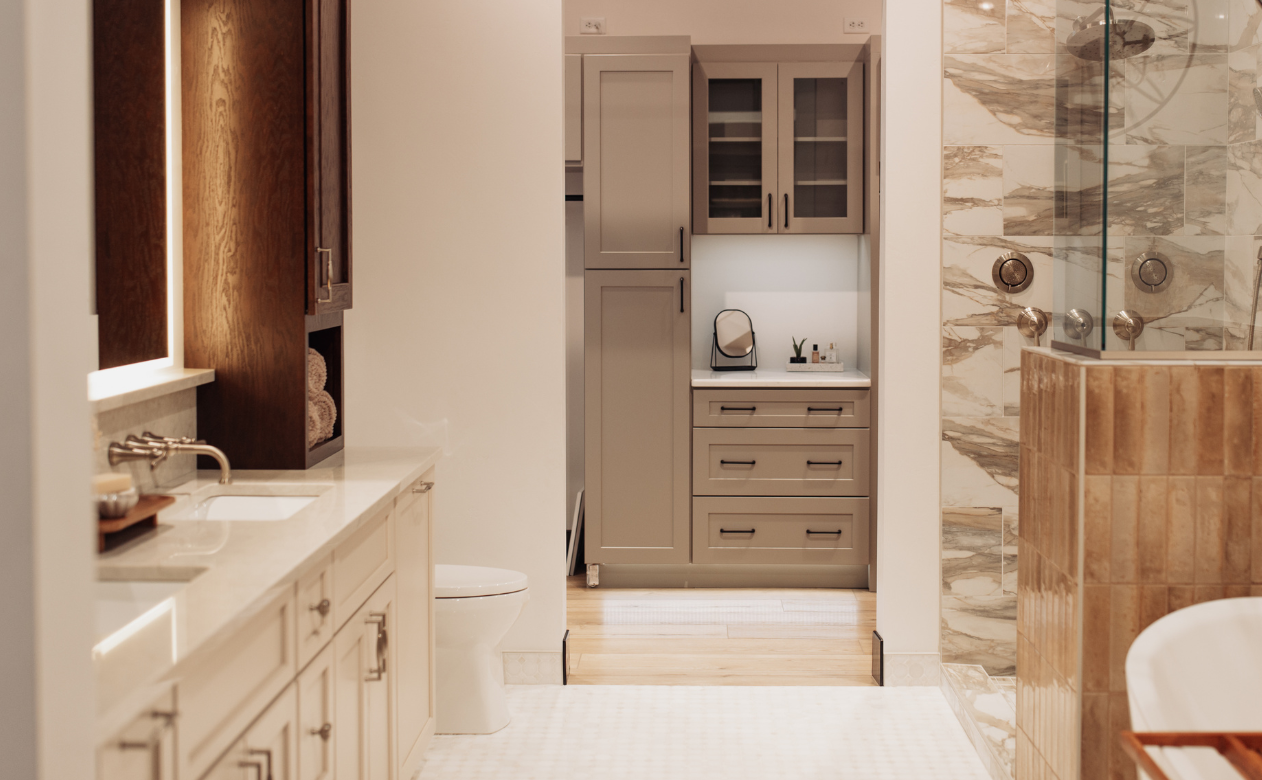 Custom wood cabinetry in a closet at D&M Interiors Kiba Studios