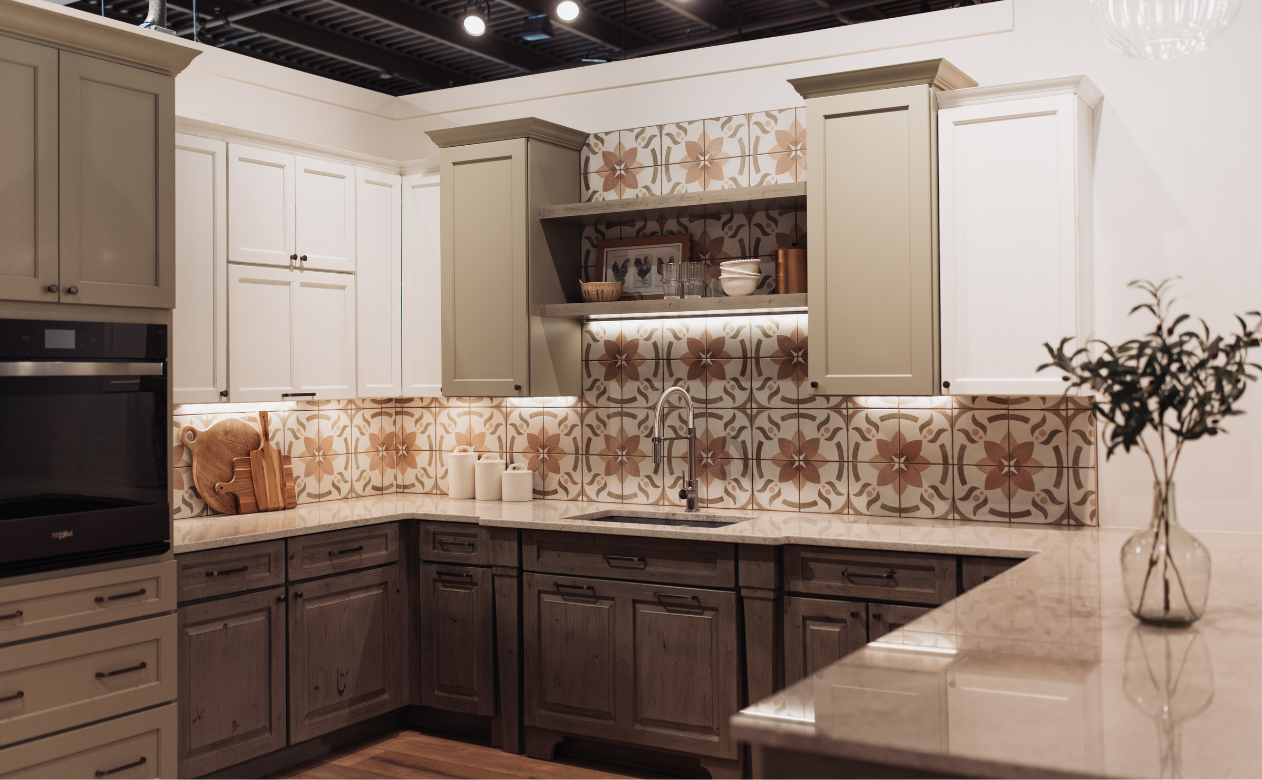 black countertops in a kitchen with terracotta cabinets