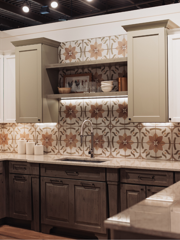 black countertops in a kitchen with terracotta cabinets