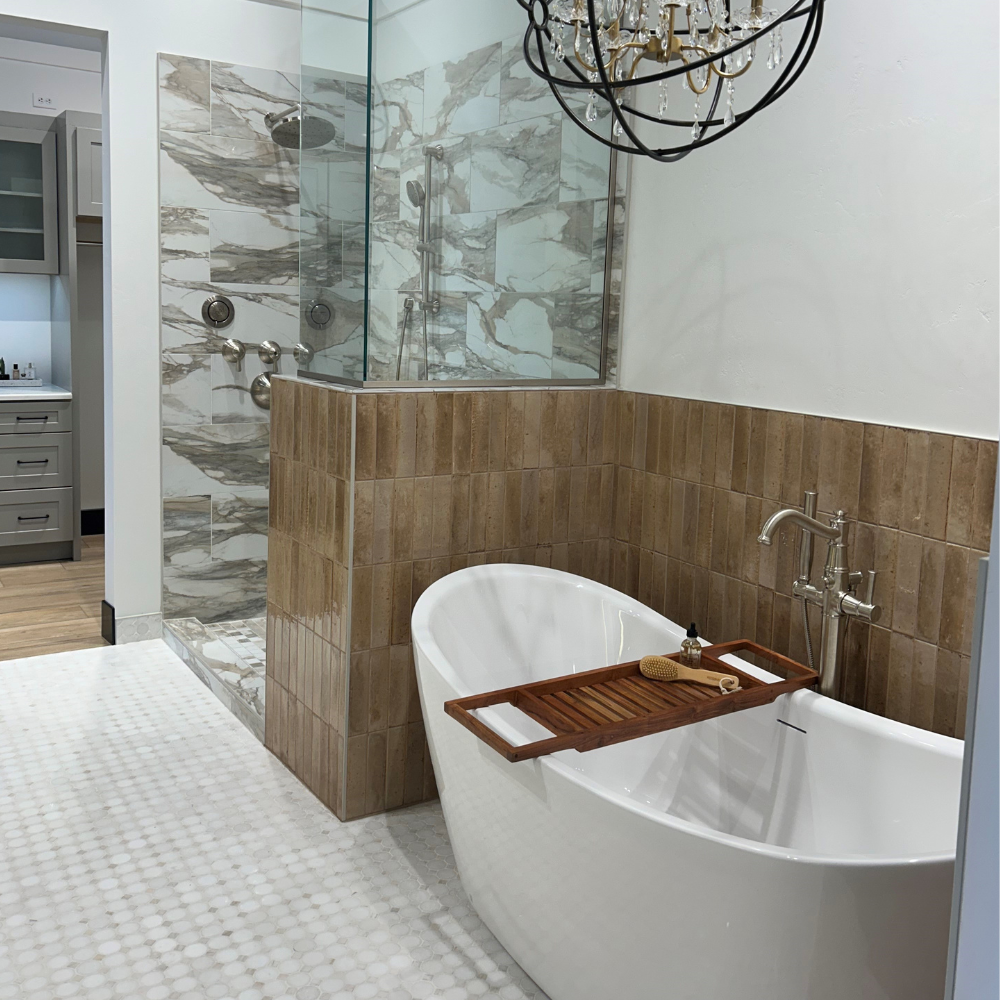 Kiba Studios bathroom display with bathtub and walk-in shower at D&M Interiors