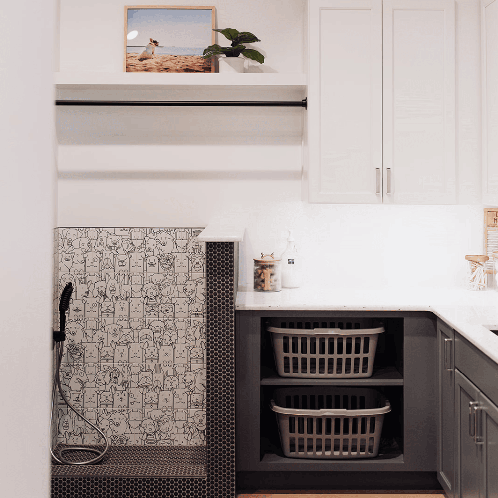 Custom laundry room with dog washing station at D&M Interiors Kiba Studios