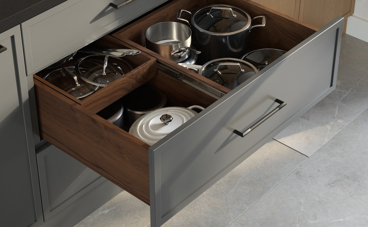 Gray pull out cabinet with built-in storage for pots and pans