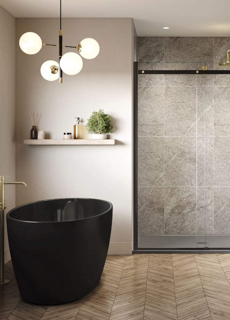 Black free standing tub with a walk-in shower and gold fixtures