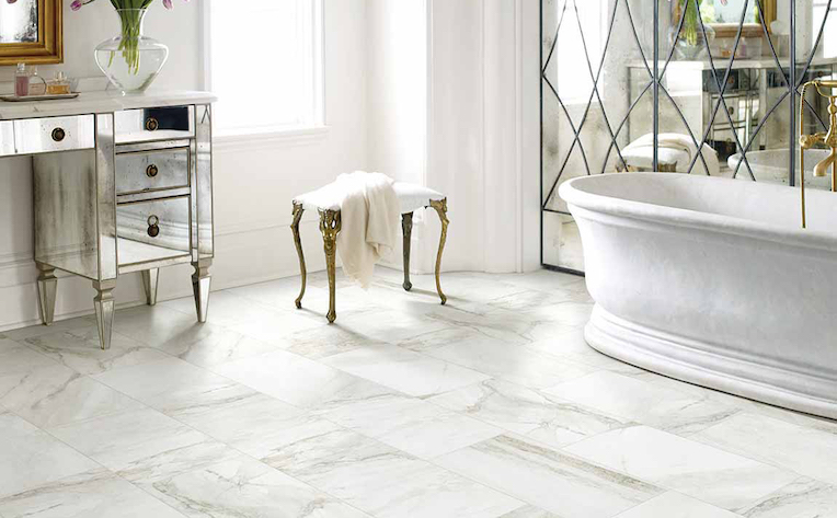 marble look porcelain tile flooring in a bright white bathroom